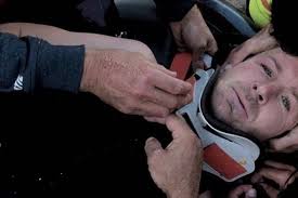 British surfer Andrew Cotton breaks back when 50ft wave crashes down