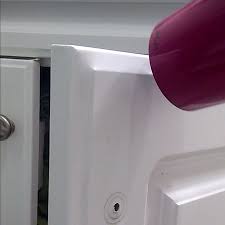 Bright purple cabinets might seem like the ultimate customization, but you might find yourself regretting this decision quickly! Home Dzine Kitchen Remove Foil Vinyl Wrap From Kitchen Cabinet Doors