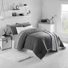 Opens a image dialog that shows a zoomed in image of this product. Ugg Harley Reversible Twin Twin Xl Comforter Set In Charcoal Comforter Sets Bedroom Comforter Sets Duvet Sets