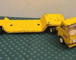 Image result for Yellow 1960 Petit Truck