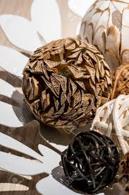 Check spelling or type a new query. Wooden Weave Decorative Balls In White Decorative Dish On Wood Table Stock Photo Picture And Royalty Free Image Image 84678853