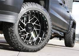 Nitto 205800 trail grappler tire in 37x12.50r20lt. Chevy Silverado W 20x12 Moto Metal 985 Wheels 33x12 50r20 Nitto Ridge Grappler Tires Wheelsasap