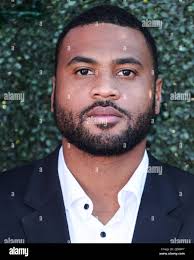 Holly robinson peete rodney peete hi-res stock photography and images