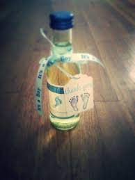 Diy Baby Shower Favors I Used Mini Barefoot Wine Bottles Moscato And Chardonnay Baby Boy Shower Favors Baby Shower Favors Baby Shower Book