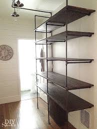 The shelf on the left provides a flat storage surface as well as a rack for hanging clothes. Tips For Making A Diy Industrial Pipe Shelving Unit Page 2 Of 2 Diy Show Off Diy Decorating And Home Improvement Blogdiy Show Off Diy Decorating And Home Improvement Blog Page 2