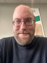 Tall gay man gets haircut and beard trim