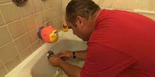 How to unclog a bath tub. How To Fix A Bathtub Drain Stopper This Old House