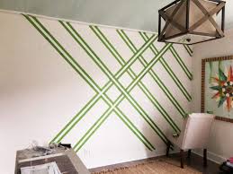 I placed the tape on walls that had been painted the day before and it did not damage them at all. Painting A Plaid Wall With Frogtape The Handmade Home