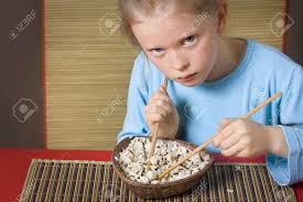 The following assets contain unreleased and/or restricted content. Little Girl In Blue Eating Rice With Chopsticks Stock Photo Picture And Royalty Free Image Image 3336904