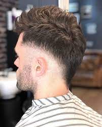 With their stylish appeal that brings in the right balance of suave and edgyness in one look, it is no wonder why many men prefer the look. 15 Best Faux Hawk Fade Haircuts For Men In 2021