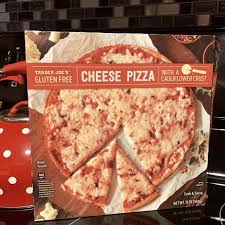 Run to your local trader joe's to pick up the new frozen crust, and then try these yummy cauliflower crust pizza recipes. Trader Joe S Cauliflower Crust Cheese Pizza Popsugar Fitness