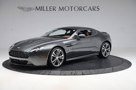 Image result for Jet Black 2012 Aston Martin
