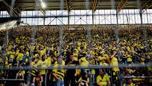Experience the excitement of the yellow wall. The Yellow Wall Borussia Dortmund Soccerbible