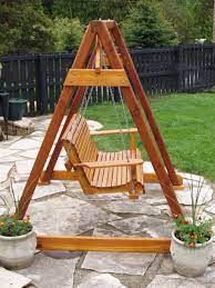 An elegant white porch swing will enhance the appeal of your porch and outdoor area. Diy Wood Freestanding Outdoor Swing Plans Google Search Porch Swing Frame Outdoor Wood Projects Diy Porch Swing