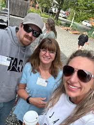 More fun photos. awesome volunteer (Jon Barnes my son) and Kristina my  daughter stopped by for support. Can't forget my granddaughter Saphira for  serving grilled onions and showing Carrie how to put