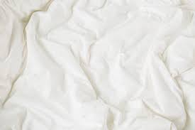Keep things chic, minimalist, and simple with a white background from unsplash. White Bedding Sheets Cozy Background Flat Lay Top View Stock Photo Affiliate Cozy Background Sheets Whit White Bed Sheets White Bedding Bed Sheets