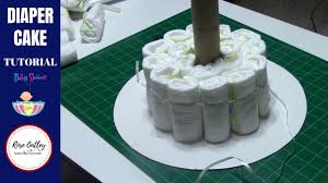 Instructions on how to make a diaper cake centerpiece | i'm going to show you easy steps on how to create a diaper cake!hey everyone! How To Make A Diaper Cake Diaper Cake Tutorial Baby Shower Ideas Youtube