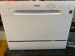 Portable dishwashers work by hooking up to your sink faucet. Help W Countertop Dishwasher Connection Adapter Home Improvement Stack Exchange