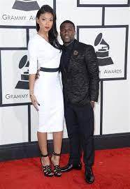 He is also known as a successful man. Kevin Hart With A Women Who With For The M Tall Girl Short Guy Tall Women Tall People Problems