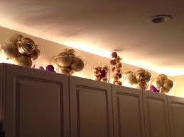 Ideas For Decorating Above Cabinets Christmas Kitchen Kitchen Cabinets Decor Christmas Kitchen Decor