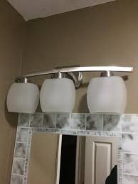 Hampton Bay Tamworth 3 Light Brushed Nickel Vanity Light With Frosted Glass Shades Iex1393a 2 The Home Depot Vanity Lighting Hampton Bay Glass Shades