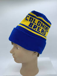 This photo is about sweater, woman, yellow. Vintage Colonial Bread Blue And Yellow Knit Hat Tobog Gem