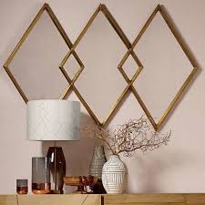Creative ideas in crafts and upcycled manufactured by fiam italia | designed by xavier lust shaped wall mirror with artistic relief. Overlapping Diamonds Mirror