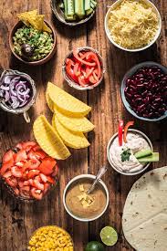 Ingredients for mexican entrees can be relatively inexpensive and easy to prepare, and the decor motifs are bright and casual. Ideas Recipes For Mexican Party Food Taco Tortilla Party Purple Avocado