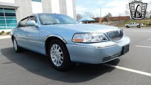Image result for Light Ice Blue 2006 Town Car