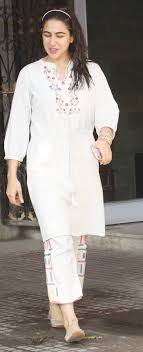 25 Pictures That Will Take You Inside Sara Ali Khan S Indian Wear Wardrobe Vogue India Seen these throwback pictures of sara posing with fans? inside sara ali khan s indian wear