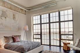 Preferably, the windows are installed in the room where the kitchen, eating table, and relaxing couch located. Floor To Ceiling Windows Literally Industrial Bedroom Baltimore By Turner Development Group Houzz