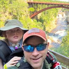 What is the best height to tap maple trees for syrup production?