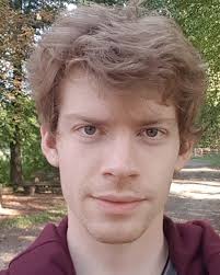 Amortized Bayesian Model Comparison With Evidential Deep Learning