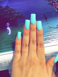 Square long pink nails with a hole design and pink gold glitter in the light of a table lamp. Matte Electric Blue Long Square Shape Acrylic Nails Square Acrylic Nails Long Acrylic Nails Blue Nails