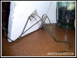 Fun With A Wire Hanger Mad In Crafts Wire Hangers Diy Book Holder Hanger Crafts