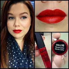 Deep red mixed with a little bit maroon.again, great for all skin shades.its a pretty bold color. Nyx Soft Matte Lip Cream Monte Carlo Nyx Soft Matte Lip Cream Soft Matte Lip Cream Matte Lip Cream