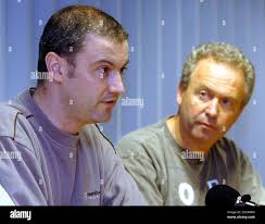 Left to right: Craig (Kenneth's son) and Philip (Kenneth's brother) speak  to the media after a video was released