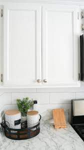 The 90's and early 2000's were filled with an influx of builder grade, stained oak cabinets and as we transitioned to 2010 and after painting remove the cup hooks and fill with plastic wood in white and lightly sand. How To Paint Honey Oak Kitchen Cabinets Collectively Casey