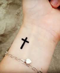 A cross tattoo can be drawn on the chest and is known as a chest cross tattoo. Small Cross Tattoo Design Small Meaningful Tattoos Meaningful Tattoos Crayon
