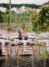 the elaborate greenery work at this couple s italian wedding had guests looking up throughout the reception tuscan wedding italian wedding wedding modern