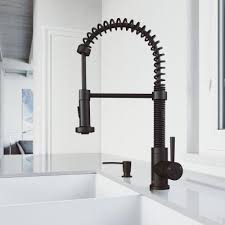 Typically, a kitchen faucet has a single handle, but there are models available with two handles, making it easier to adjust water temperature. Black Kitchen Faucets Kitchen The Home Depot