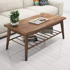 It's so sturdy and works perfectly with rustic or industrial decor. Wooden Coffee Table With Spindle Shelf Furniture123