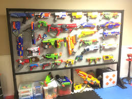 Nerf blasters are not shaped like boxes, so don't arrange them as if they were. Pin On Nerf Gun Storage