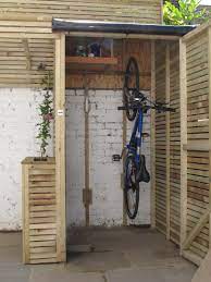 Pin By Lisa Lev Design On For The Cabin Small Sheds Bike Shed Vertical Bike Storage