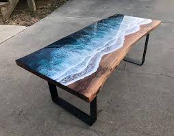 These Artists Create Mesmerizing Tables That Look Like They Re Being Washed By An Ocean Wave In 2020 Wood Furniture Plans Wood Table Wooden Tables