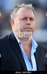 Football agent Willie McKay watches The Willie McKay Sports Management  Handicap Stakes Stock Photo