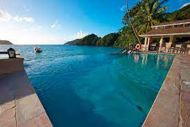 The blue waters inn is a small and friendly beachside hotel located beside the sea in gorgeous batteaux bay, on the outskirts of speyside. Blue Waters Inn Tobago British Airways