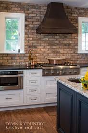 We still have product details and accessories, scroll down to see them! Brick Backsplash Kitchen By Town Country Kitchen And Bath With Native Trails Custom Range Hood And Nat Brick Kitchen Kitchen Remodel Brick Backsplash Kitchen