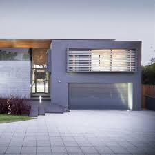 Using glass garage doors to open up interior spaces. Modern Gray Frameless Glass Garage Door 8 X 7 Hintex Home Interior Exterior Building Materials