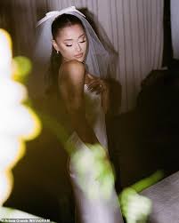 The singer opted for a strapless silk ariana grande and dalton gomez tied the knot earlier this month, and we finally have the photos to. Ariana Grande S Wedding Slideshow Becomes The Most Popular Instagram Post Geeky Craze